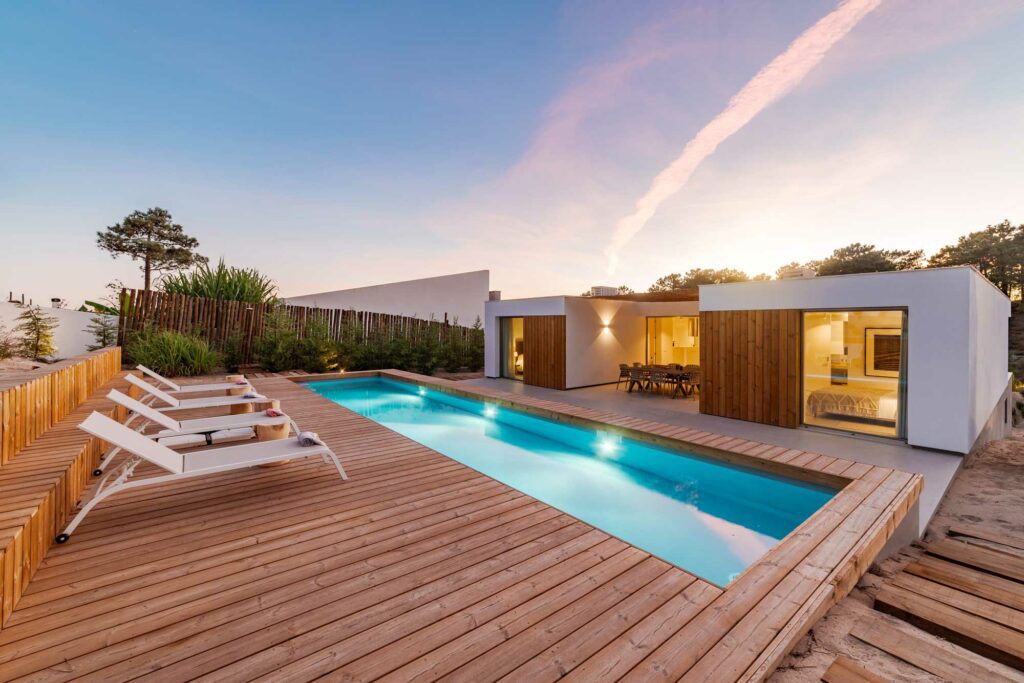 Backyard unit with a deck and pool