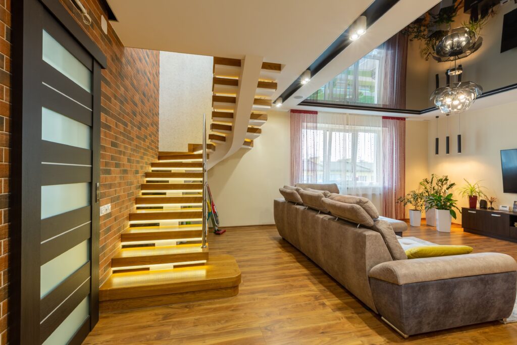 Remodeled living room with a modern staircase